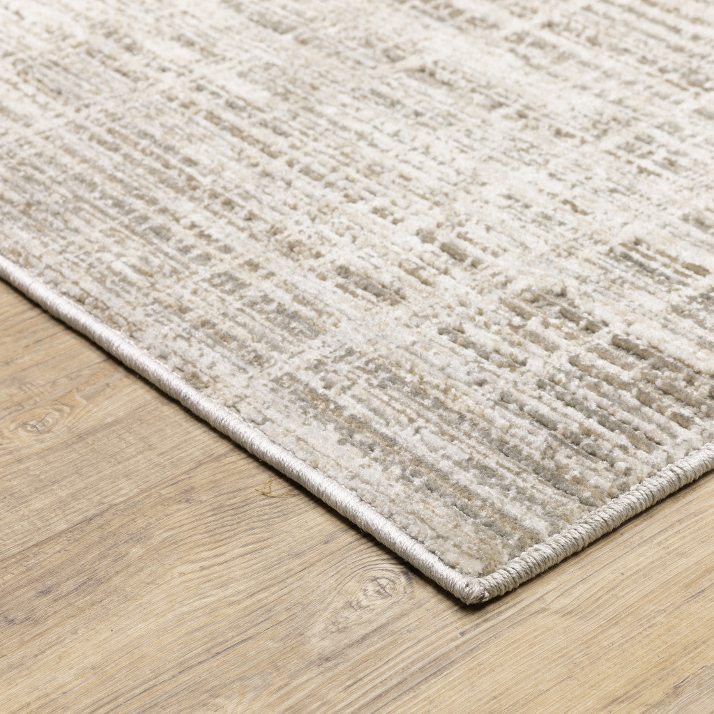 2' X 8' Beige Grey Ivory Tan And Brown Abstract Power Loom Stain