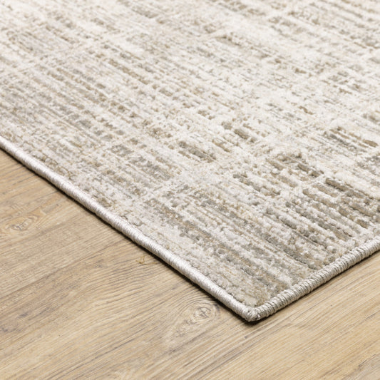 2' X 8' Beige Grey Ivory Tan And Brown Abstract Power Loom Stain
