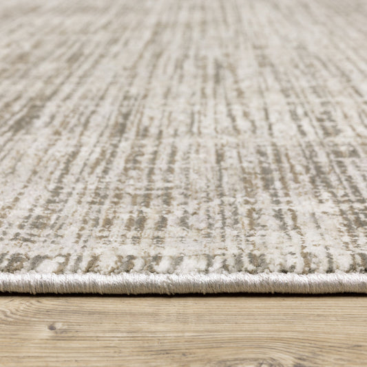 2' X 8' Beige Grey Ivory Tan And Brown Abstract Power Loom Stain